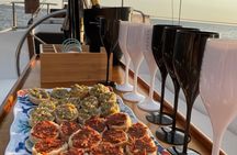 Aperitif at sunset on a sailboat
