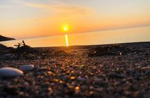 Golden Hour Escape on Relaxing Sunset Boat Tour with Local Wine