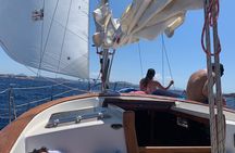 Sailing La Maddalena Archipelago at Sunset with Aperitif 