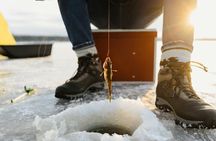 Ice Fishing Adventure in Lapland's Arctic Wilderness in Levi