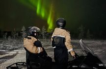 Arctic Aurora Chase by Snowmobile