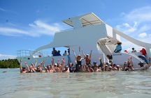 Private Catamaran with Snorkeling, Slide Coast Cruise & Open Bar
