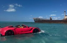 Explore Shipwreck and Hidden Island Beaches in 1-Hour Jetcar Tour