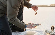 Ice Fishing Adventure in Lapland's Arctic Wilderness in Levi