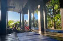 Yoga at sunrise at Sofitel Moorea, overlooking Tahiti