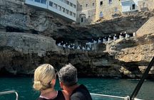 Boat tour from Monopoli to the Polignano caves with aperitif 