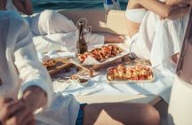 Boat tour from Monopoli to the Polignano caves with aperitif 
