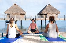 Yoga on the paradise beach of Manava Moorea