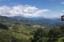 Medellin Tour to Cocorna Slide Extreme Paragliding and Rafting