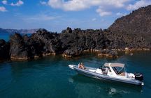 Private boat tour along the coastline of Santorini and volcano
