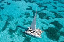 Sail Away Catamaran Day Trip with Snorkeling to Isla Mujeres