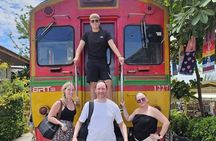 Maeklong Railway and Damnoen Saduak Floating Market Guide Tour 