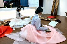 Play Gayageum in Hanbok Cultural Experience in Bukchon