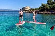 SUP Adventure in Alghero : Tour through the Coves of Lazzaretto