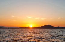 Boat Sunset Aperitif Tour in Tavolara and Molara