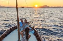 Boat Sunset Aperitif Tour in Tavolara and Molara