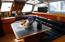 Mykonos Catamaran Cruise Private Tour with Meals and Drinks