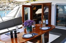 Mykonos Catamaran Cruise Private Tour with Meals and Drinks
