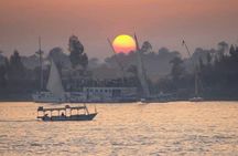 Felucca Sailboat ride on the Nile at Sunset with Tea time 