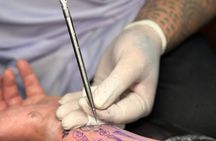 Traditional Thai Tattoo Experience with Ceremony