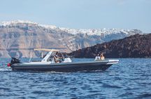 Island hopping (Santorini & Ios)on a private motorboat 