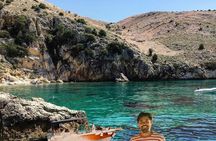Take a half-day trip to the wild bays with captain Adorio & Dino 
