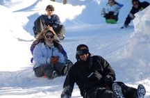 Adventure in Piedras Blancas: Sledding Day with Transfers 