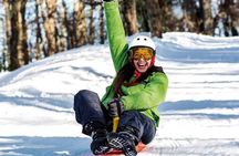 Adventure in Piedras Blancas: Sledding Day with Transfers 