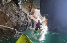 Guided kayaking trip exploring the secrets of the Tenby coastline