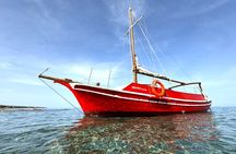 Private Cruise: Explore Rina’s Cave & Enjoy Fresh Seafood Onboard