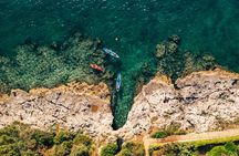 Pula: Three Islands Kayak Tour – snorkeling & cave photo stop