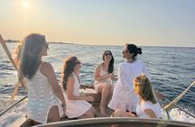 Group boat ride in Polignano between caves, swimming and aperitif