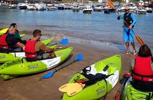 Guided kayaking trip exploring the secrets of the Tenby coastline