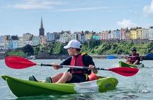 Guided kayaking trip exploring the secrets of the Tenby coastline