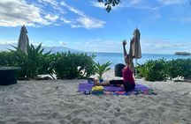 Yoga at sunrise at Sofitel Moorea, overlooking Tahiti
