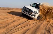 Dubai Half-Day Desert Tour: Camel Ride, Quad Bike & BBQ Dinner