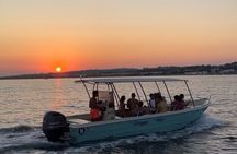 Boat excursion at sunset