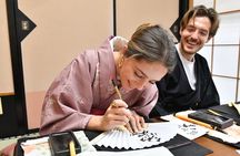 Learning Zen of Japanese Calligraphy in kimono near Osaka Castle