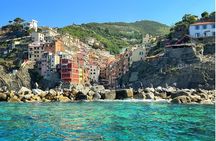 Private tour to Cinque Terre on a traditional Ligurian gozzo boat.