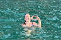 Private tour to Cinque Terre on a traditional Ligurian gozzo boat.