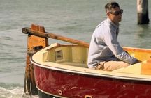 Sunset in a typical boat in Venice