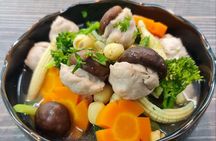 Cook & Enjoy an Vietnamese Family Meal in a Serene Garden Villa