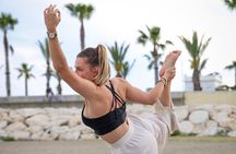 Holistic Sunset Beach Yoga Experience in Malaga with Maria