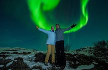 Northern Lights Small-Group Tour with Photos, Snacks & Snowsuits