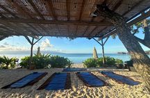 Yoga at sunrise at Sofitel Moorea, overlooking Tahiti