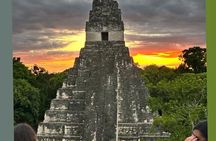 From Flowers Sunrise in Tikal and Sunset in Yaxha in a day
