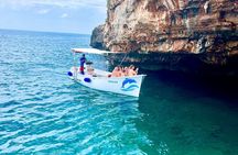 By boat between the two Seas to discover the Caves of S.M. diLeuca
