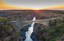 Luxury Train to Victoria Falls Scenic Bridge Ride and Gastronomy