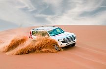 Abu Dhabi: Morning Dune Drive, Camel Ride & Sandboarding