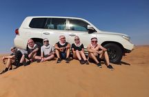 Dubai Desert Safari: Dune Bashing, Camel Ride, BBQ Dinner.